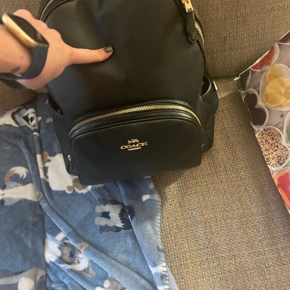 Brand new used once coach backpack! Doesn’t fit my laptop by 2 inches my loss